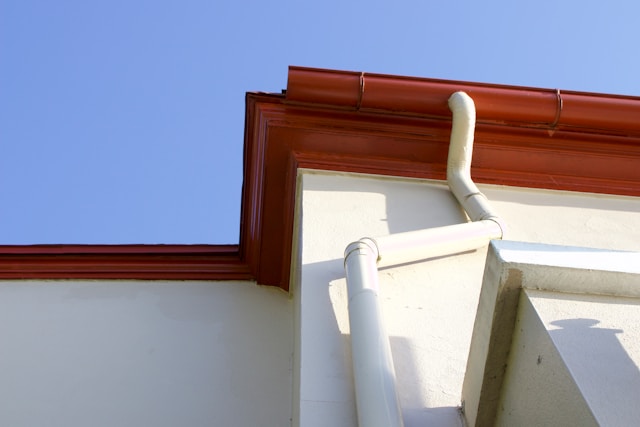Seasonal Gutter Cleaning and Downspout Flushing for Better Water Flow and Home Protection